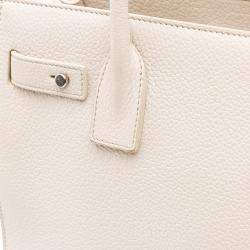 مملوكة مسبقًا حقيبة سان لوران باريس ساك دي جور جلد عجل أبيض صغير برسومات