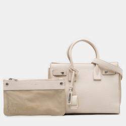 مملوكة مسبقًا حقيبة سان لوران باريس ساك دي جور جلد عجل أبيض صغير برسومات