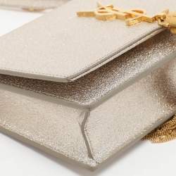 مملوكة مسبقًا محفظة بسلسلة سان لوران باريس كيت تاسيل فضية لامعة