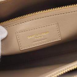 مملوكة مسبقًا حق يبة يد صغيرة سان لوران ساك دي جور جلد عاجي