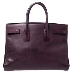 مملوكة مسبقًا حقيبة يد سان لوران ساك دو جور كبيرة جلد عنابية