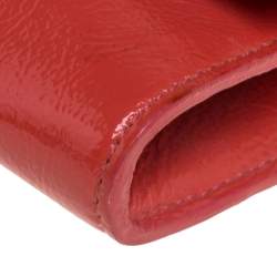 مملوكة مسبقًا حقيبة كلتش سان لوران بل دو جور جلد لامع برتقالية