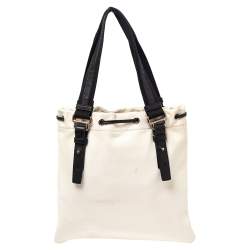 مملوكة مسبقًا حقيبة يد توتس سان لوران كاهالا جلد وكانفاس أسود/كريمي 