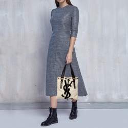 مملوكة مسبقًا حقيبة يد توتس سان لوران كاهالا جلد وكانفاس أسود/كريمي 