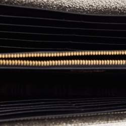 مملوكة مسبقًا  محفظة سان لوران  جلد مونوغرامي مبطن ذهبي ميتالك نمط مظروف بسلسلة