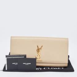Pre Owned Saint Laurent Beige Leather Cassandra Flap Clutch 