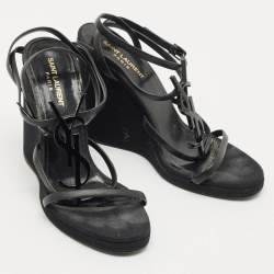 Pre Owned صندل سان لوران جلد أسود كاساندره بكعب إسفين وأشرطة مقاس 39