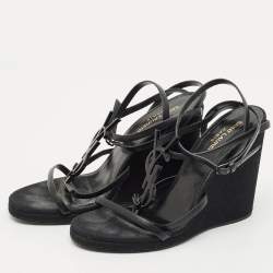 Pre Owned صندل سان لوران جلد أسود كاساندره بكعب إسفين وأشرطة مقاس 39