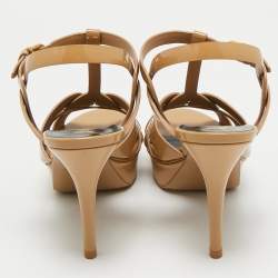 Pre Owned صندل سان لوران تريبيوت جلد لامع بيج نعال سميك بحزام للكاحل مقاس 38