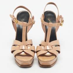 مملوكة مسبقًا صندل ساند لوران نعال سميك تريبوت جلد لامع بيج مقاس 38.5