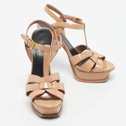 مملوكة مسبقًا صندل ساند لوران نعال سميك تريبوت جلد لامع بيج مقاس 38.5