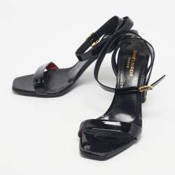 مملوكة مسبقًا صندل سان لوران أوبيوم جلد أسود لامع حزام حول الكاحل مقاس 40.5