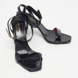 مملوكة مسبقًا صندل سان لوران أوبيوم جلد أسود لامع حزام حول الكاحل مقاس 40.5