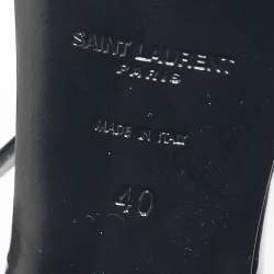 مملوكة مسبقًا صندل سان لوران أوبيوم جلد أسود لامع حزام حول الكاحل مقاس 40.5