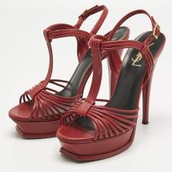 مملوكة مسبقًا صندل سان لوران نعل سميك جلد أحمر مع شريط للكاحل مقاس 38