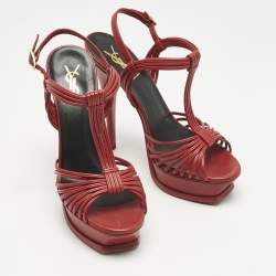 مملوكة مسبقًا صندل سان لوران نعل سميك جلد أحمر مع شريط للكاحل مقاس 38