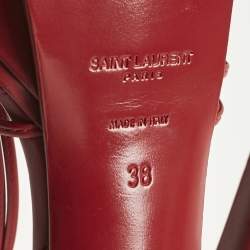 مملوكة مسبقًا صندل سان لوران نعل سميك جلد أحمر مع شريط للكاحل مقاس 38