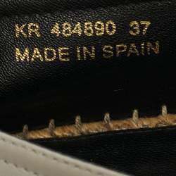 مملوكة مسبقًا حذاء فلات سان لوران إسبادريل كاساندرا جلد بيج مقاس 35.5