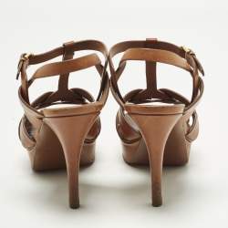 مملوكة مسبقًا صندل بكعب سان لوران تريبوت جلد بني بحزام للكاحل مقاس 39.5