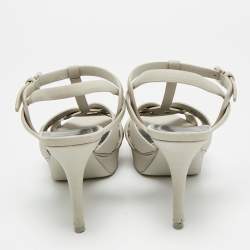 Pre Owned صندل سان لوران باريس نع ل سميك تريبيوت جلد منقوش كريمي مقاس 36