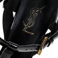 Pre Owned صندل سان لوران باريس تريبوت جلد أسود لامع بحزام للكاحل مقاس 38.5