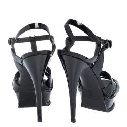 مملوكة مسبقًا صندل سان لوران باريس تريبوت نعل سميك جلد لامع أسود مقاس 39.5