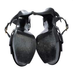 مملوكة مسبقًا صندل سان لوران باريس تريبوت نعل سميك جلد لامع أسود مقاس 39.5