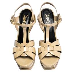 مملوكة مسبقًا صندل سان لوران باريس نعل سميك تريبيوت جلد بيج لامع مقاس 39