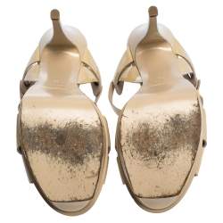 مملوكة مسبقًا صندل سان لوران باريس نعل سميك تريبيوت جلد بيج لامع مقاس 39