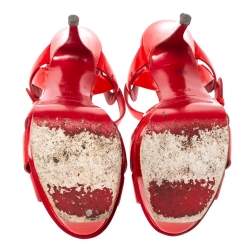 مملوكة مسبقًا صندل سان لوران باريس تريبوت نعل سميك جلد لامع منقوش أحمر مقاس 37.5