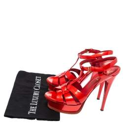 مملوكة مسبقًا صندل سان لوران باريس تريبوت نعل سميك جلد لامع منقوش أحمر مقاس 37.5