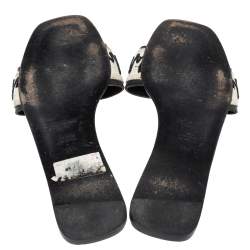 مملوكة مسبقًا صندل سلايد فلات سان لوران باريس مزين نقشة نبضات القلب جلد و كانفاس أبيض و أسود مقاس 35.5