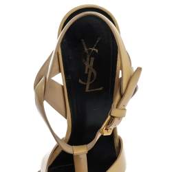 مملوكة مسبقًا صندل سان لوران باريس "تريبوت" جلد لامع بيج مقاس 39