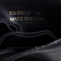 مملوكة مسبقًا حذاء بوت كاحل سان لوران مزين إبزيم جلد أسود مقاس 38