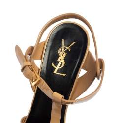 مملوكة مسبقًا صندل سان لوران تريبوت جلد بيج لامع مقاس 41