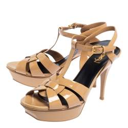 مملوكة مسبقًا صندل سان لوران تريبوت جلد بيج لامع مقاس 41