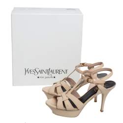 مملوكة مسبقًا صندل سان لوران تريبيوت جلد بيج لامع مقاس 37.5