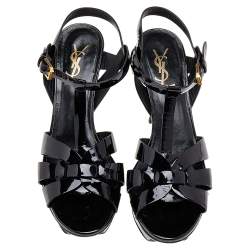مملوكة مسبقًا صندل سان لوران باريس نعل سميك تريبيوت جلد لامع أسود مقاس 38