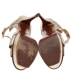 Pre Owned صندل سان لوران تربيوت جلد ذهبي بنعل سميك مقاس 35.5