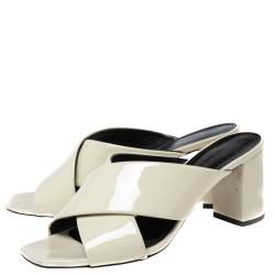 Pre Owned صندل سلايد سان لوران لولو جلد لامع كريمي سيور متعاكسة مقاس 37