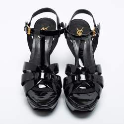 مملوكة مسبقًا صندل سان لوران تربيوت جلد أسود لامع نعل سميك مقاس 39