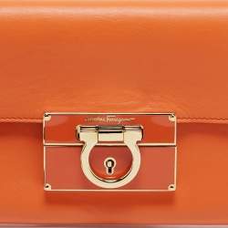 Salvatore Ferragamo Orange Leather Afef Lock Story Wristlet Clutch