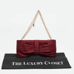 مملوكة مسبقًا حقيبة كلتش سالفاتوري فيراغامو ساتان بورجوندي مزينة فيونكة بسلسلة