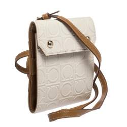 Pre Owned Salvatore Ferragamo White/Brown Gancini Embossed Leather Wallet Bag