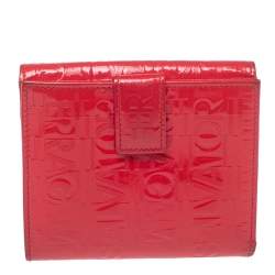 Pre Owned Salvatore Ferragamo Pink Monogram Embossed Patent Leather Gancini Triifold Wallet