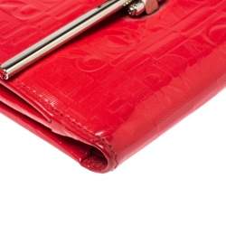 Pre Owned Salvatore Ferragamo Pink Monogram Embossed Patent Leather Gancini Triifold Wallet