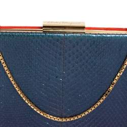 مملوكة مسبقًا Salvatore Ferragamo Orange/Iridescent Suede and Python Chain Clutch