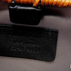 مملوكة مسبقًا  حقيبة كلتش سالفاتوري فيراغامو راتان وساتان أخضر /أسود بفيونكة وسلسلة