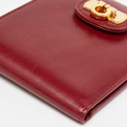 Pre Owned Salvatore Ferragamo Burgundy Leather Gancini Flap Compact Wallet