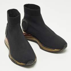 مملوكة مسبقًا حذاء رياضي سالفاتوري فيراغامو نسيج محبوك وجلد أسود بعنق مرتفع مقاس 38.5